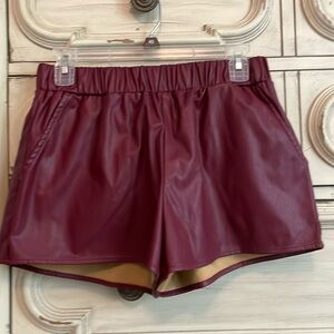 Women’s maroon size medium poly blend shorts